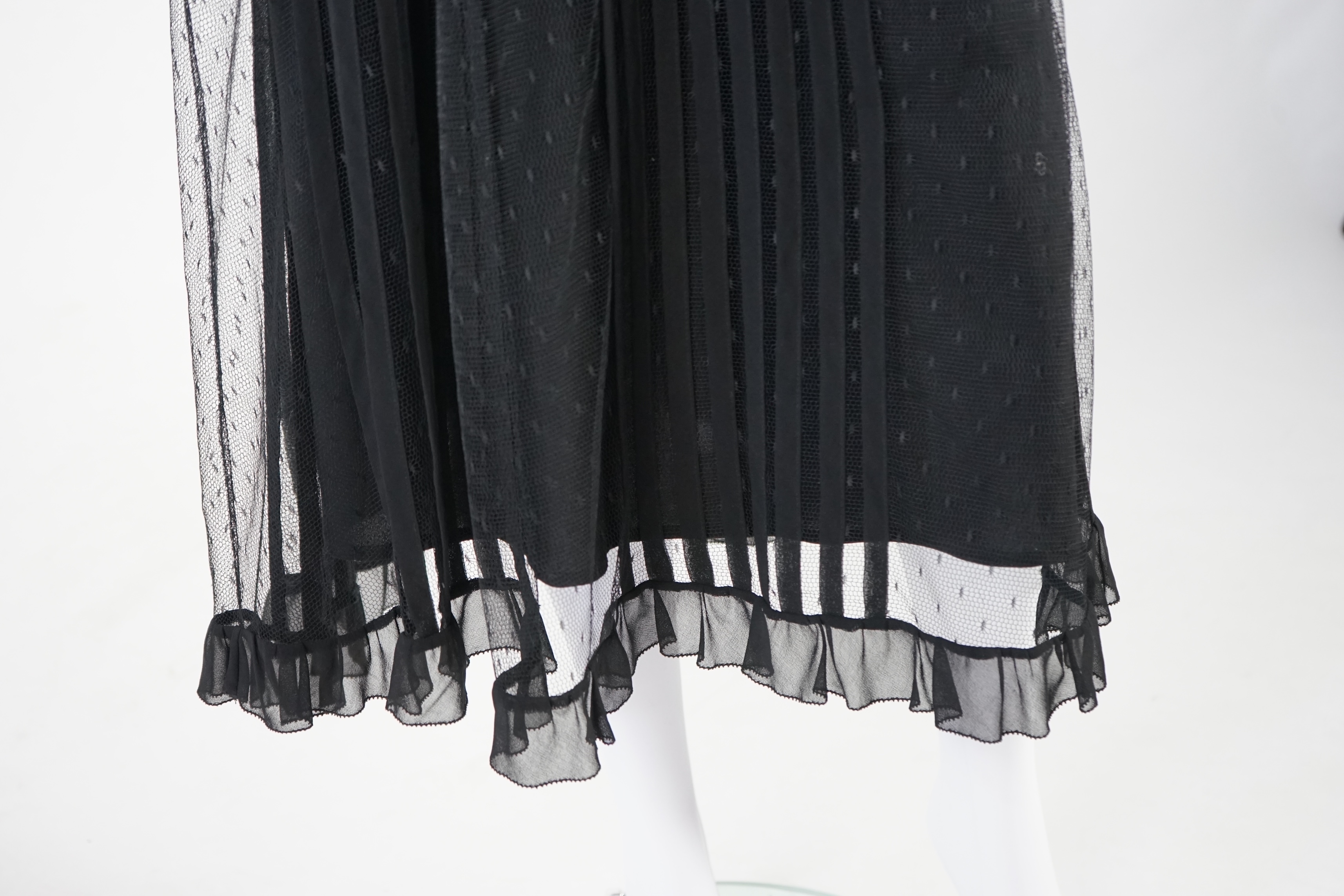A Red Valentino black lace dress with under slip. Proceeds to Happy Paws Puppy Rescue